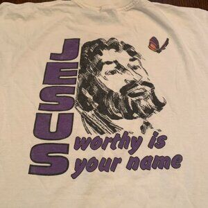 White Jesus graphic tee with purple accents
